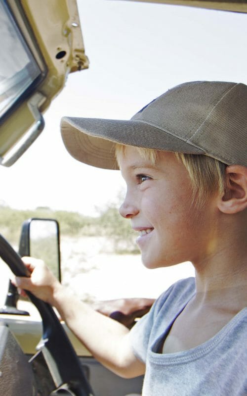 Child driving, Family safari package, Botswana
