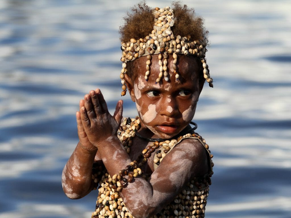 Kumbarumba, Sepik River village girl with shells, Papua New Guinea