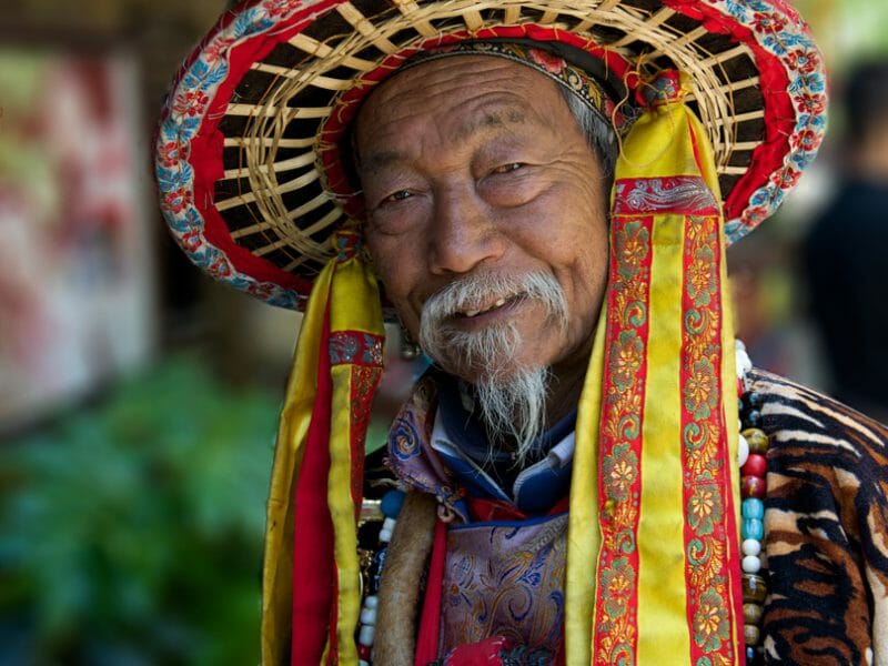 Man dressed in Naxi Nationality Outfit, Lijiang, China