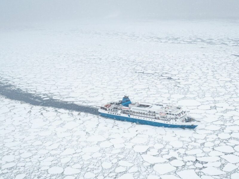 MS Seaventure, Aerial view of ship ice breaking, Antarctica
