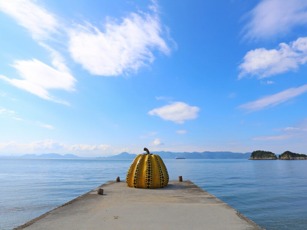 Yellow pumpkin art at end of jetty, Naoshima Island, Seto Inland Sea, Setouchi, Japan