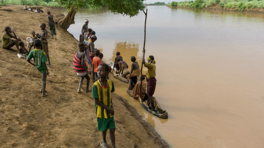 Local people by Omo River, Ethiopia