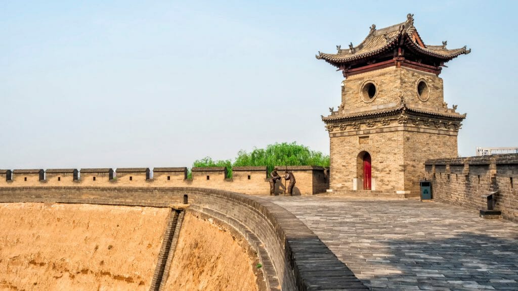 Curved section of Pingyao city walls with  tower.