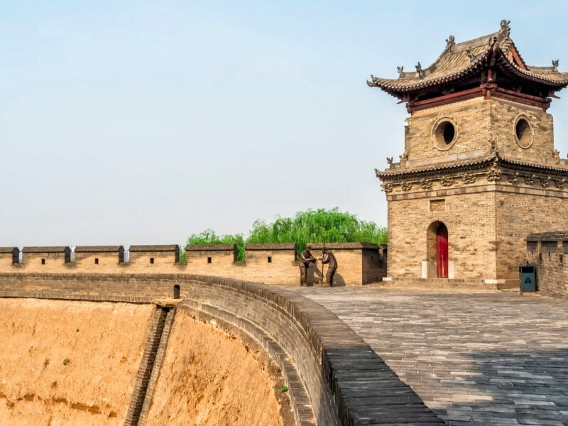 Curved section of Pingyao city walls with  tower.