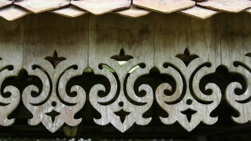 Traditional Malay carving on a house