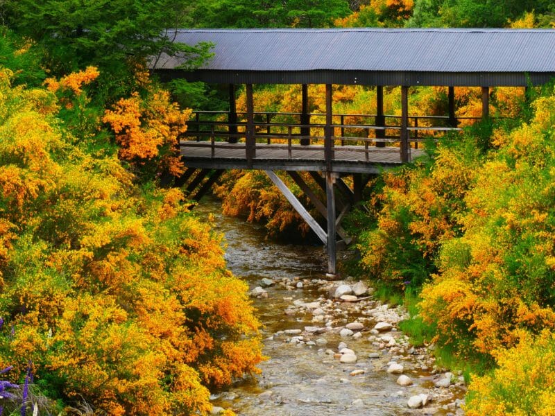 Wood covered bridge in the small town of Villa La Angostura