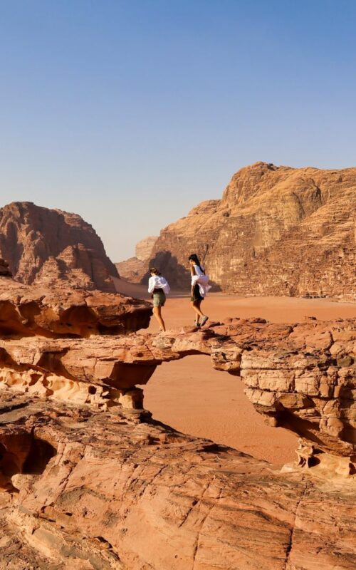 People exploring Wadi Rum, Jordan