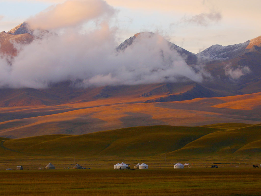 Nomads' yurts and mountains, Mongolia