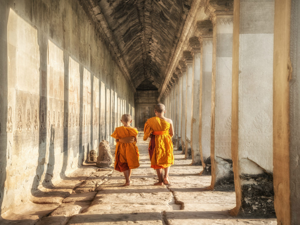 Two neophytes walking in an Angkor Wat, Siem Reap, Cambodia