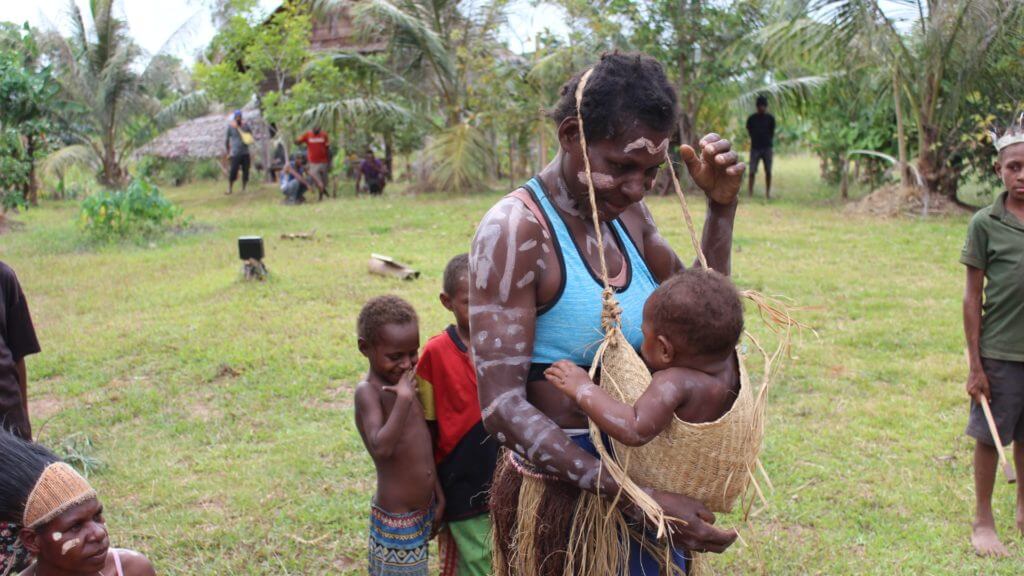 Lady with baby, Lake Murray, Papua New Guinea
