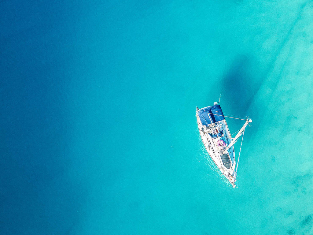 Sailing boat in clear blue water Croatia