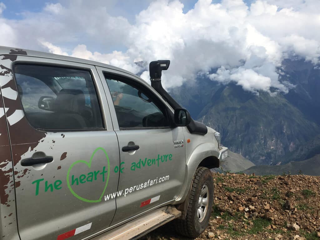 Peru Safari vehicle looking overlooking Sacred Valley, Peru