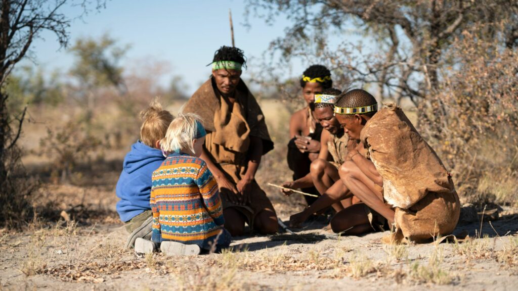 Children with Kalahari bushmen, Botswana
