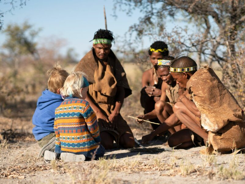 Children with Kalahari bushmen, Botswana