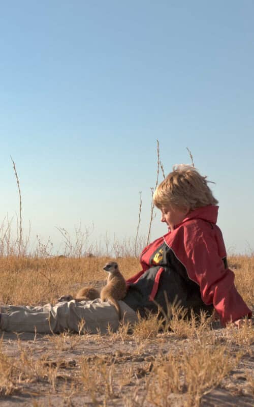 George Laing with Meerkats, Kalahari, Botswana