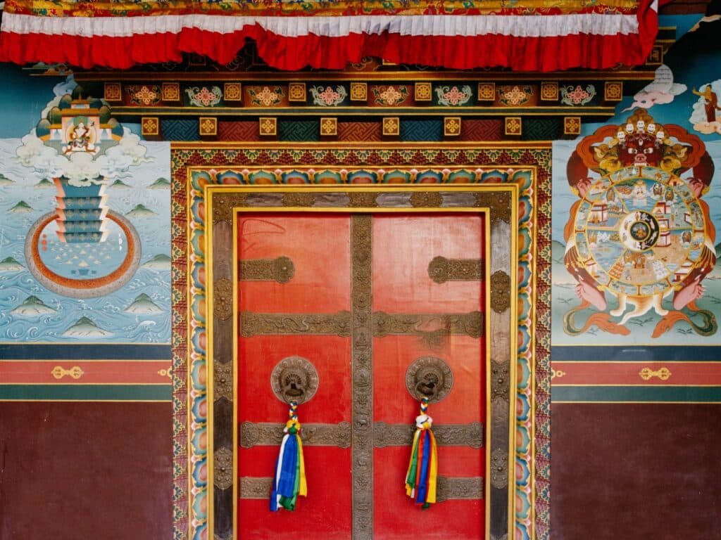 Bright red ornate door in Kagbeni village, Mustang, Nepal