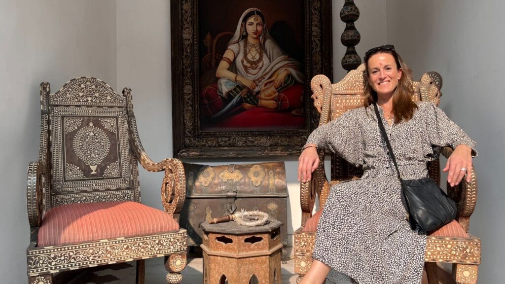 Charlotte sat in a chair in Rajasthan