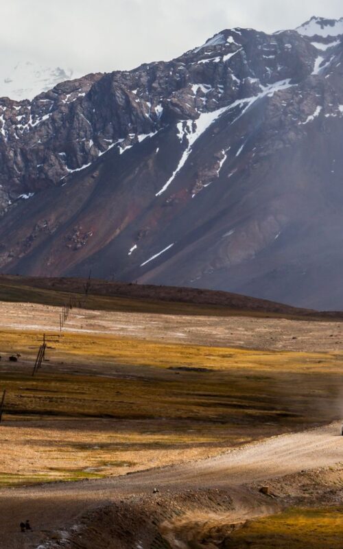 4x4 vehicle driving Pamir Highway, Tajikistan