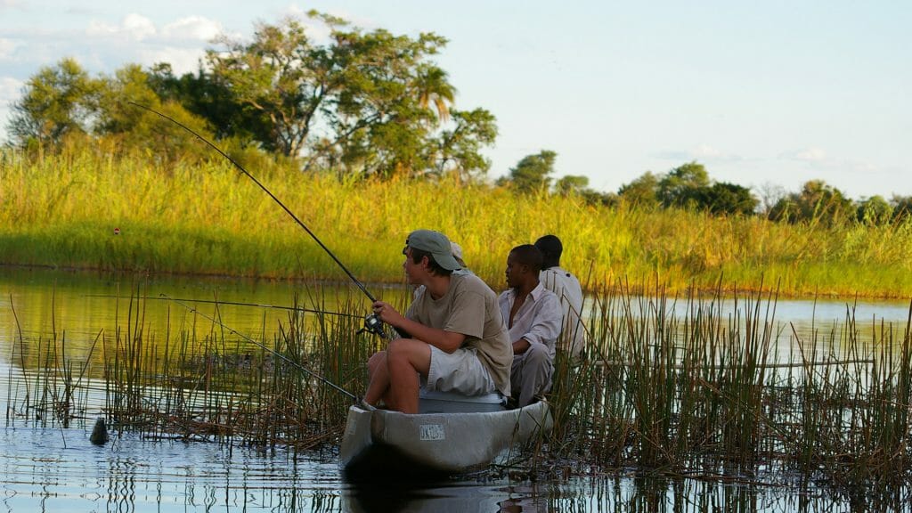 Canoe fishing, Family safari package, Botswana