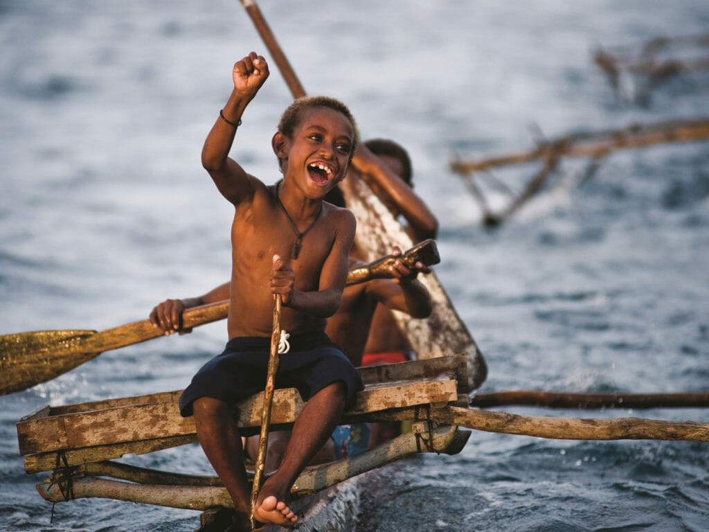 Children on Dug Out Canoes, Papua New Guinea