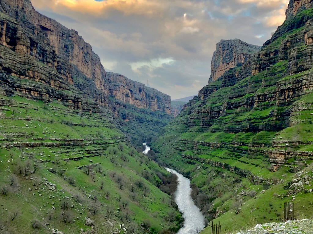 A lush valley with a river running through it; home to the remains of the ancient Hamilton Road in Iraqi Kurdistan