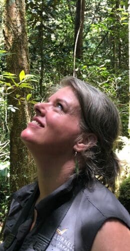 Illona profile image, sat with plane in background