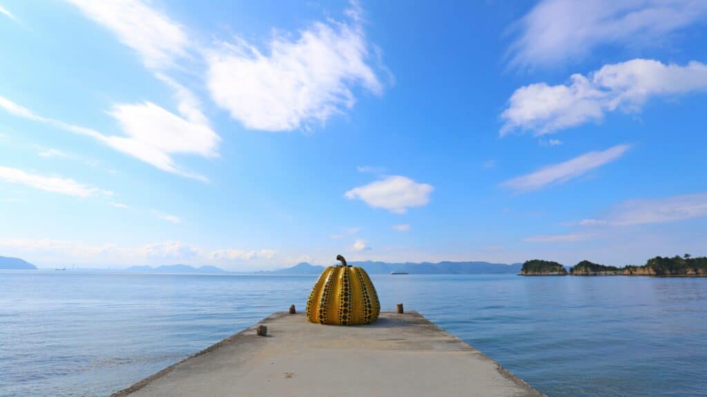 Yellow pumpkin art at end of jetty, Naoshima Island, Seto Inland Sea, Setouchi, Japan