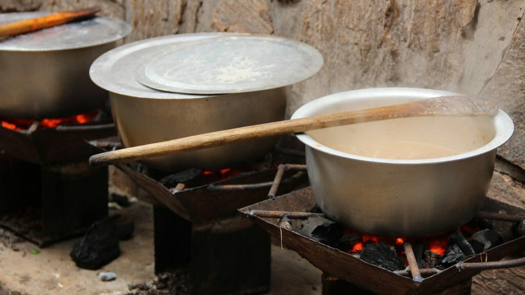 Cooking pots on fire, Nyamirambo District, Kigali, Rwanda
