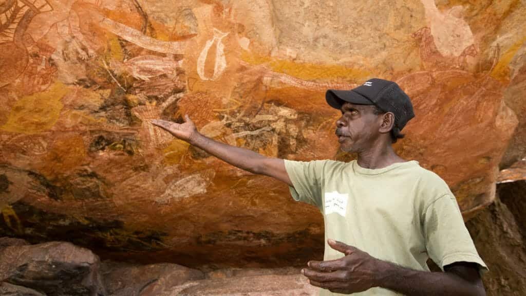 Aboriginal guide explaing rock art.