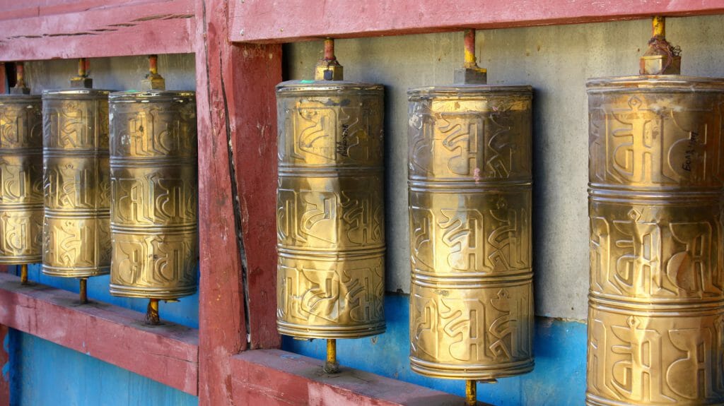 Row of buddhist prayer wheels in Gandan Monastery, Ulaanbaatar, Mongolia