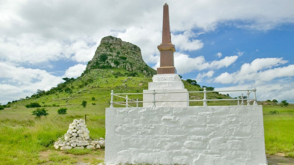 Sandlwana hill or Sphinx with soldiers graves in foreground, KwaZulu Natal Battlefields, South Africa