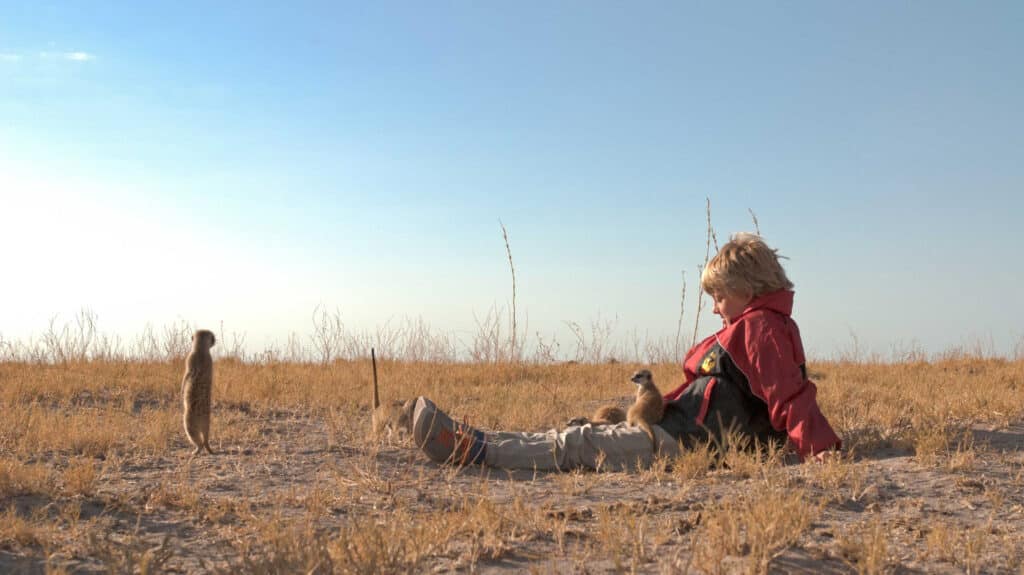 George Laing with Meerkats, Kalahari, Botswana