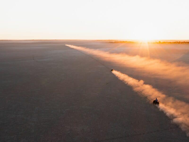 Quad biking across Makgadikgadi pans, Kalahari, Botswana