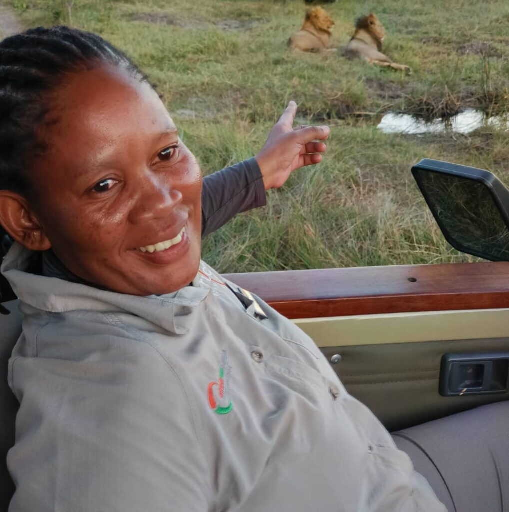 Lady on game drive Maemo Botswana